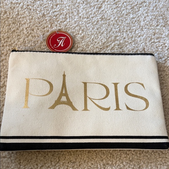 andy & co. Handbags - Pochette Paris Canvas Pouch with Gold Lettering By Andy & Co.The SouvenirFactory